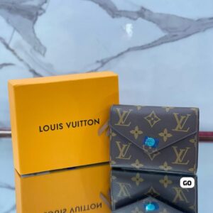 Brown LV Monogram Wallet clasp