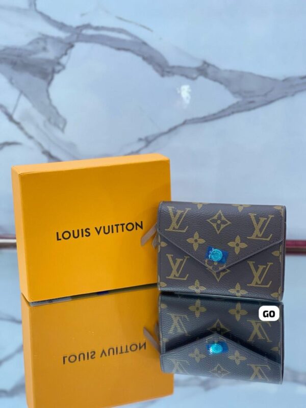 Brown LV Monogram Wallet clasp
