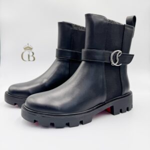 Botas Louboutin de piel negras broche plata