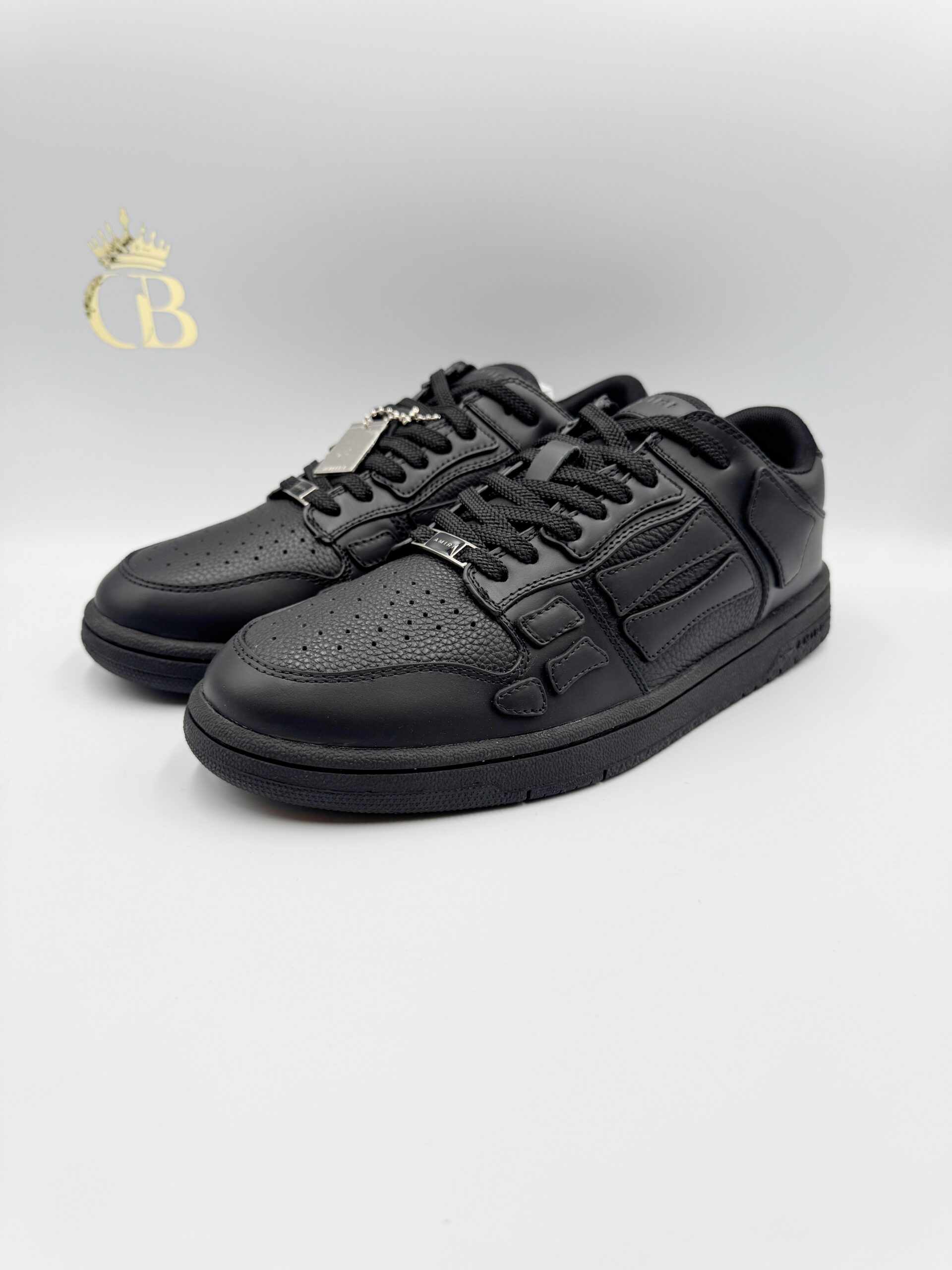 Amiri Skel Negro de Piel